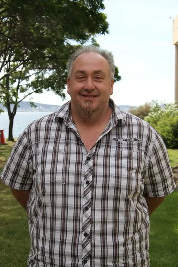 A headshot of Alain Protat