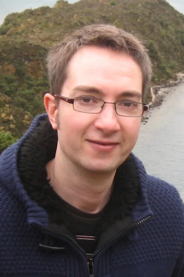 A headshot of Christopher Holloway