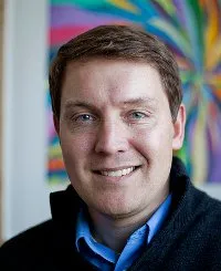 A headshot of Derek Posselt