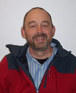 A headshot of Gerald Mace