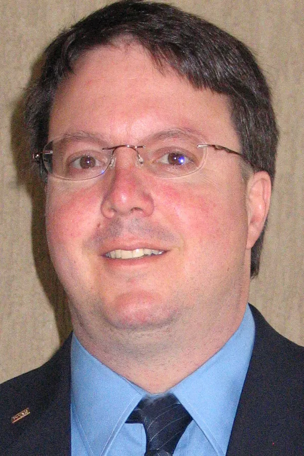 A headshot of Christian Jakob