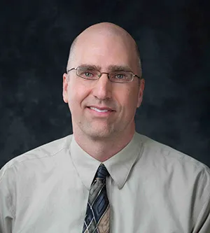 A headshot of Mark Kulie