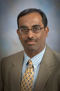 A headshot of Venkatachalam Chandrasekar
