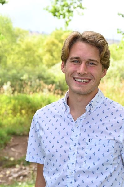 A headshot of Andrew Muehr