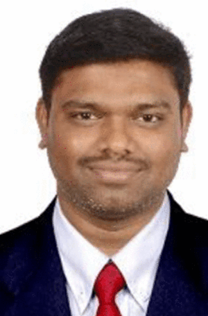 A headshot of Chandra Radhakrishnan