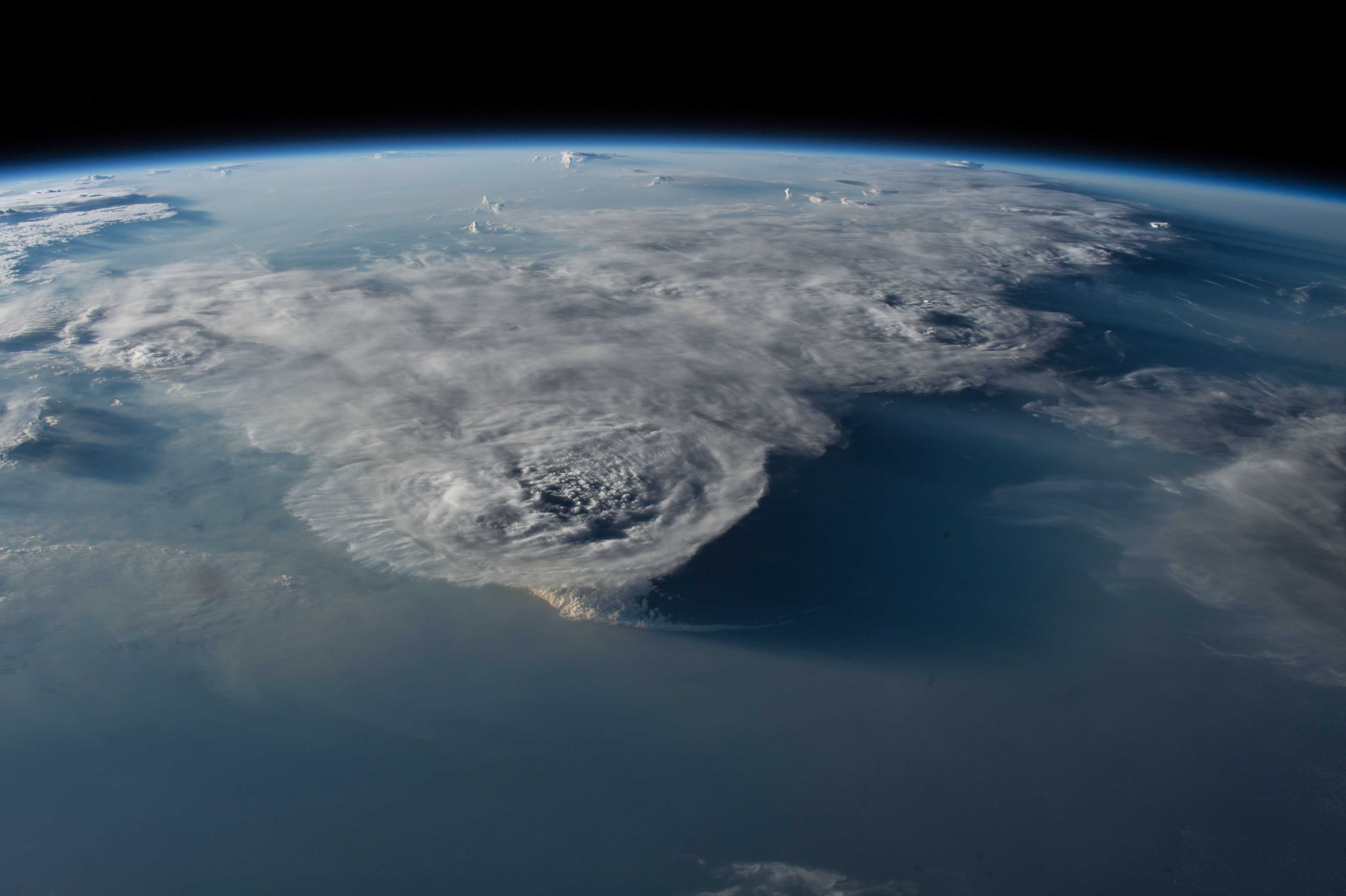 Multiple convective storms with overshooting tops clearly visible photographed from space